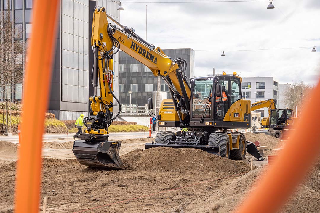 MX16G Two Of Them At Work City Construction Site